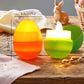 Leuchtende Ostereier mit LED-Kerzen